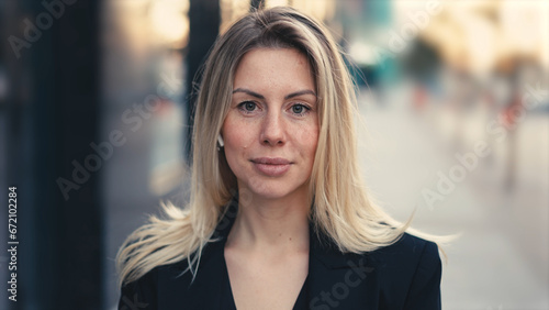 Free Download Pretty 30s business woman. Beauty sexy girl look at camera. Happy american person smile close up. 40s years old female face portrait. Lady boss wear formal black suit. White teeth concept. Blond hair. - GFXLoad
