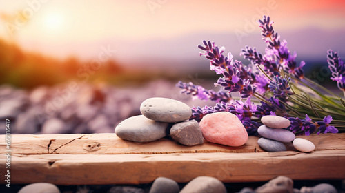 Stones and lavenders on wooden desk on background