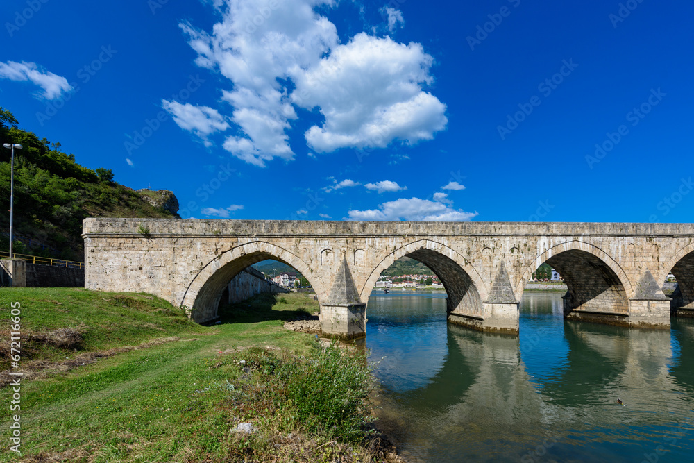 Visegrad, Bosnia and Herzegovina - August 13, 2023: Famous bridge on the Drina in Visegrad, Bosnia and Herzegovina. Mehmed Pasa Sokolovic Bridge on Drina River