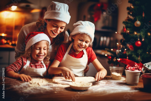 Photo of a woman and two children baking cookies together