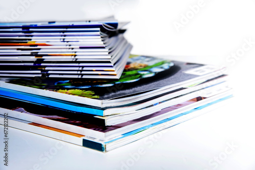 stack of magazines on white background