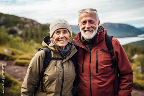 happy older couple outdoors on a hiking trail