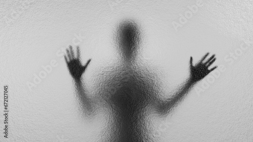 Blurred silhouette behind matte glass. Creepy Halloween concept.