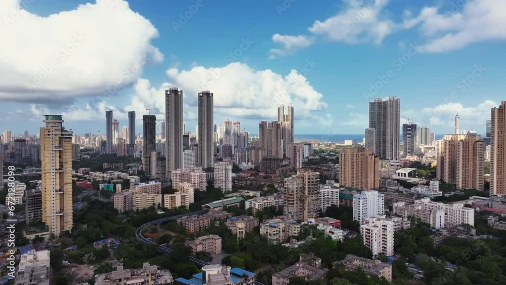 Arial view of Mumbai Skyline, high-rise buildings in Mumbai, Maharashtra India. Cinematic Timelapse shot of Indian cityscape. Most Posh Areas of Worli-Lower Parel in Mumbai. Arial view of Mumbai Skyline, high-rise buildings in Mumbai, Maharashtra India. Cinematic Timelapse shot of Indian cityscape. Most Posh Areas of Worli-Lower Parel in Mumbai.