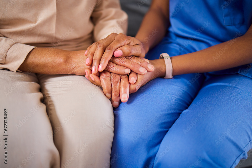 Hands, medical or support with a nurse and patient in a living room for love, trust or care during treatment. Healthcare, empathy and a black woman medicine professional comforting a clinic resident Hands, medical or support with a nurse and patient in a living room for love, trust or care during treatment. Healthcare, empathy and a black woman medicine professional comforting a clinic resident