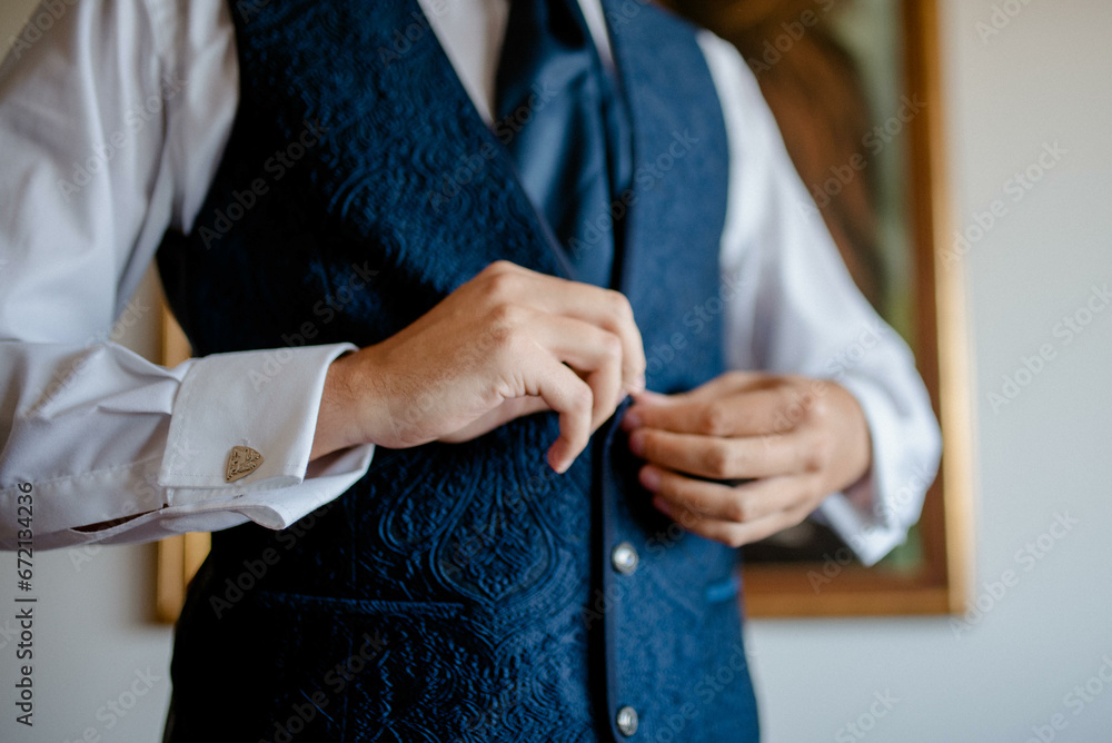 A young businessman is getting dressed
for a meeting. The beginning of a new working week.
A young businessman is getting dressed
for a meeting. The beginning of a new working week.