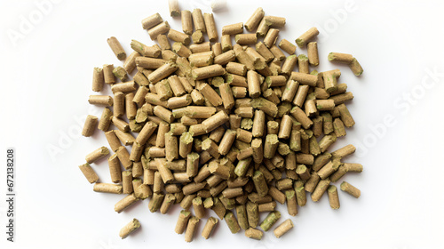 Top view of dry green grass pellets isolated on white background