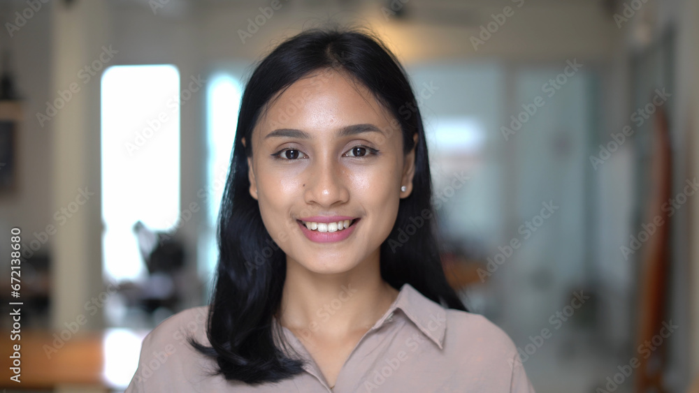 Asian 30s woman portrait closeup. Chinese girl look at camera coworking background. Japanese person smile. Young korean female. Adult people face. Nice make up freelance. Serious brunette work China. Asian 30s woman portrait closeup. Chinese girl look at camera coworking background. Japanese person smile. Young korean female. Adult people face. Nice make up freelance. Serious brunette work China.
