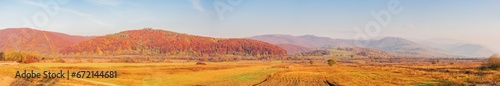 mountainous carpathian rural landscape in morning light. countryside scenery in autumn