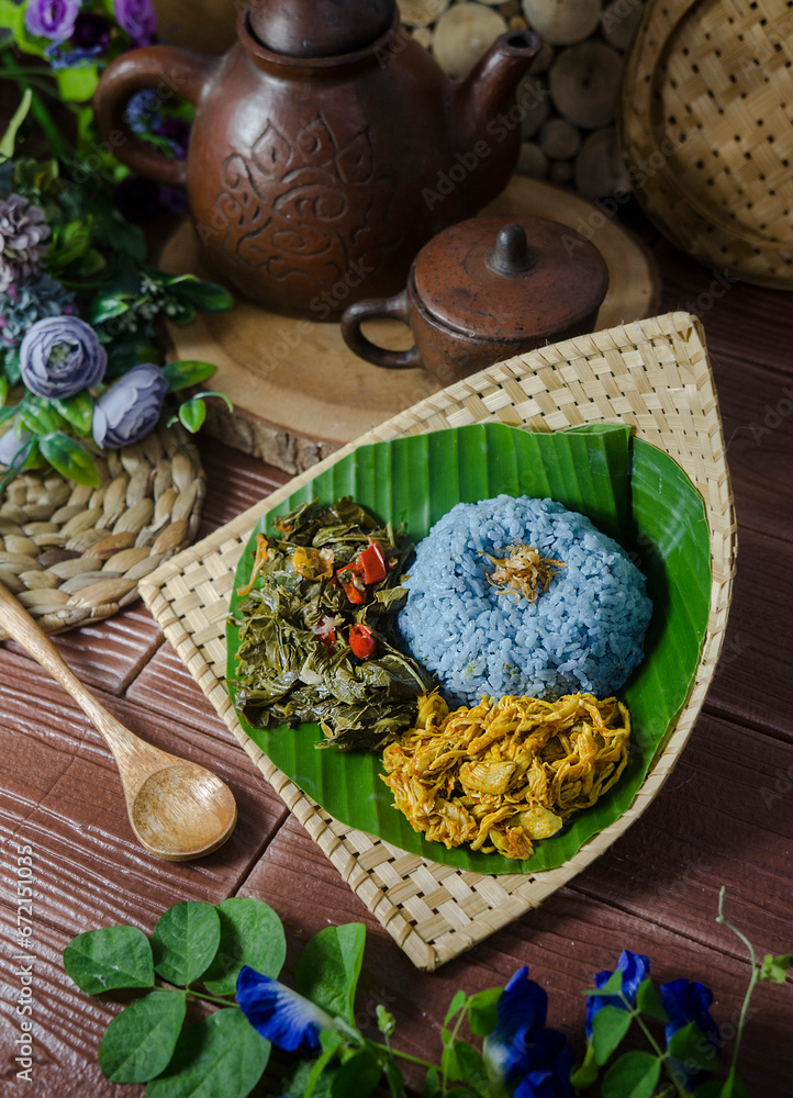 The blue colour of Nasi Kerabu comes from the petals of the butterfly ...