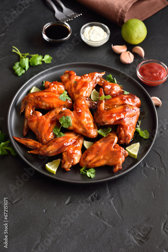 Grilled chicken wings on plate