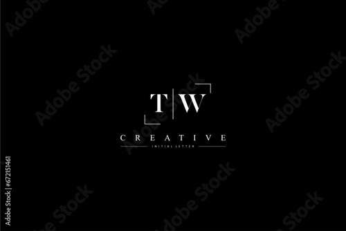 minimalist TW initial logo with simple vertical stroke line in black