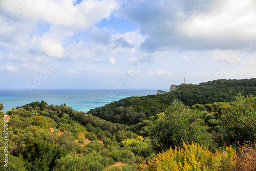  View over wooded mountains and olive plantations to Cape Drastis in the north of the island of Corfu