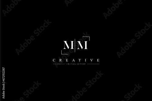 minimalist MM initial logo with simple vertical stroke line in black