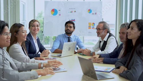 group of multi-ethnic diversity business people applauding during meeting in office with young indian business manager man