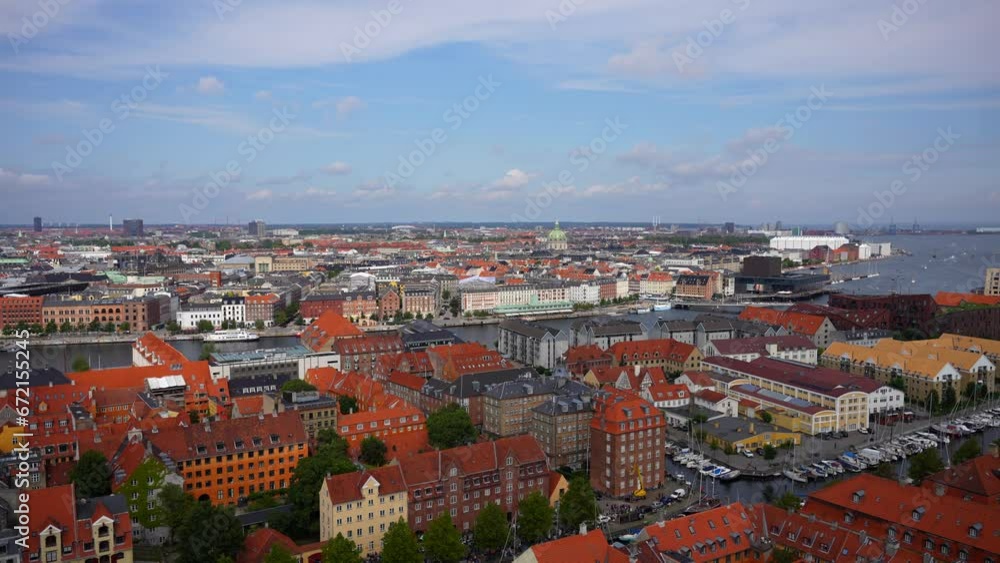 Stunning view of Copenhagen city with red roofs and palaces towers, Denmark Stunning view of Copenhagen city with red roofs and palaces towers, Denmark