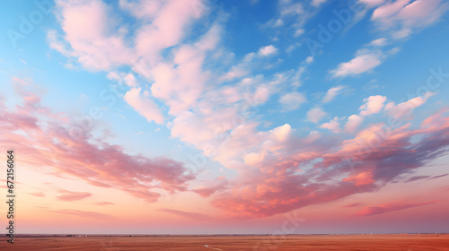 A dreamy wallpaper of wispy clouds against a vibrant sunset sky, invoking a sense of wonder and serenity. © CanvasPixelDreams