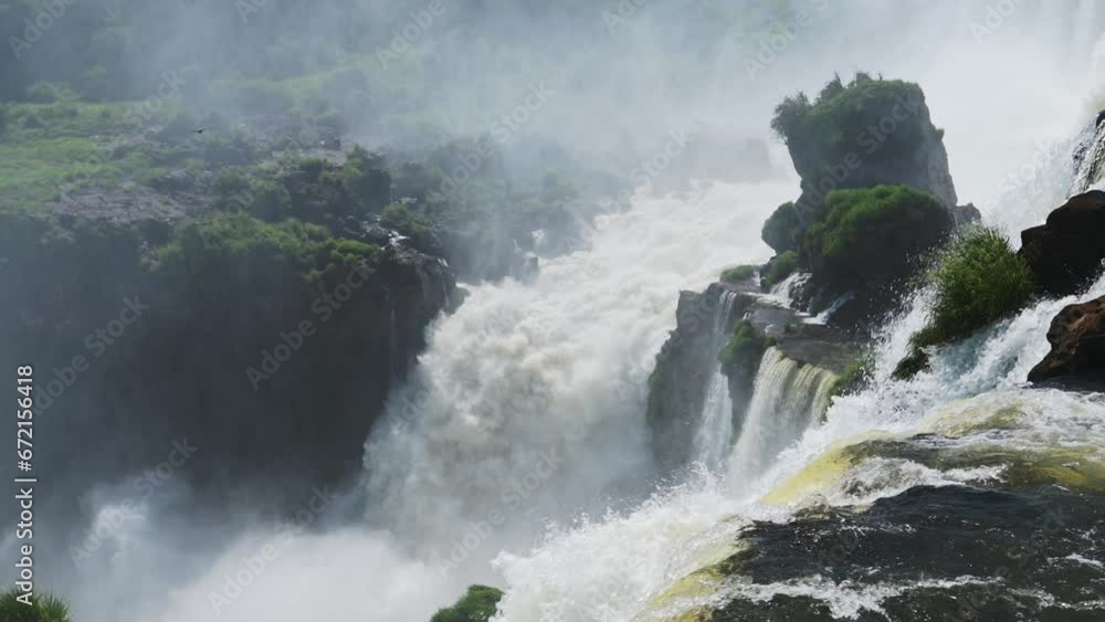 Amazing Colourful Landscape of Beautiful Bright Watervall Valleys, Large Stretch of Long Waterfalls in Blue Sunny Weather Conditions, Rocky Landscapes in Iguazu Falls, Brazil, South America Amazing Colourful Landscape of Beautiful Bright Watervall Valleys, Large Stretch of Long Waterfalls in Blue Sunny Weather Conditions, Rocky Landscapes in Iguazu Falls, Brazil, South America