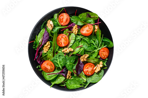Vegetarian salad with mix leaves mangold, swiss chard, spinach, arugula and nuts in a salad bowl. Transparent background. Isolated