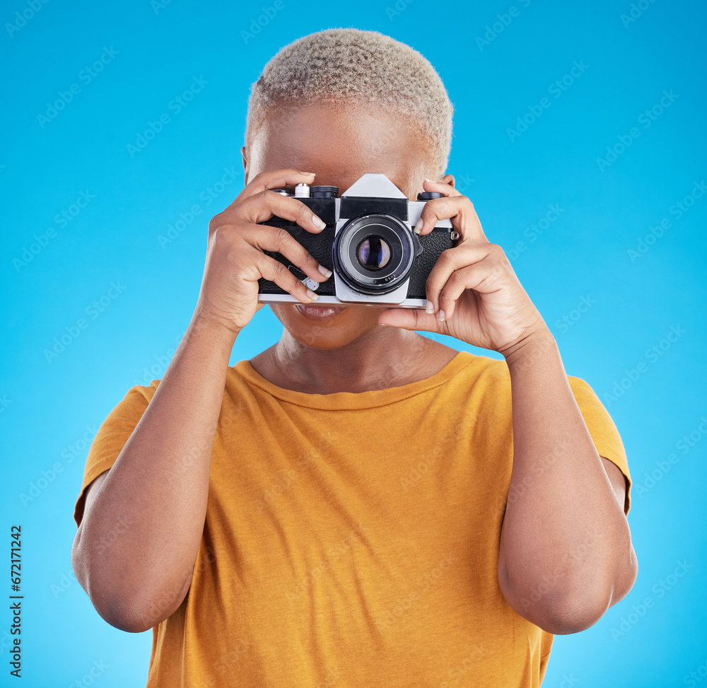 Photographer woman, retro camera and studio for journalist job, art or photoshoot by blue background. African girl, lens and tech for creativity, production or content creation for paparazzi magazine Photographer woman, retro camera and studio for journalist job, art or photoshoot by blue background. African girl, lens and tech for creativity, production or content creation for paparazzi magazine