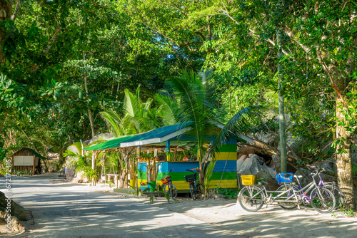 Obraz na płótnie Bikes and beach bar on the road of La Digue island, Seychelles w salonie