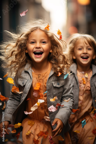 Fun-Loving Kids Sprinkling Confetti in Casual Outfits © 22Imagesstudio