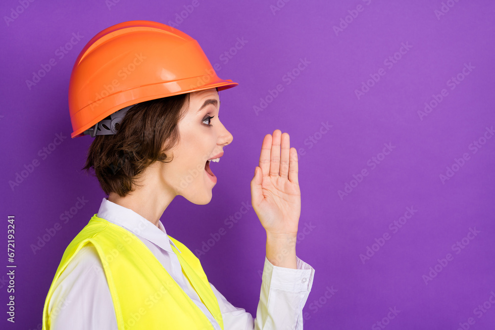 Profile photo of yell nice brunette hair lady wear builder uniform isolated on vivid purple color background Profile photo of yell nice brunette hair lady wear builder uniform isolated on vivid purple color background