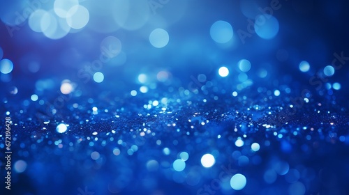 Sapphire glitter bokeh background with shimmering royal blue sparkles and crystal droplets