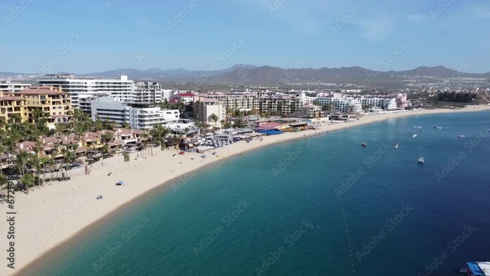 Crystal clear blue waters and sandy beaches in Cabo San Lucas, Mexico