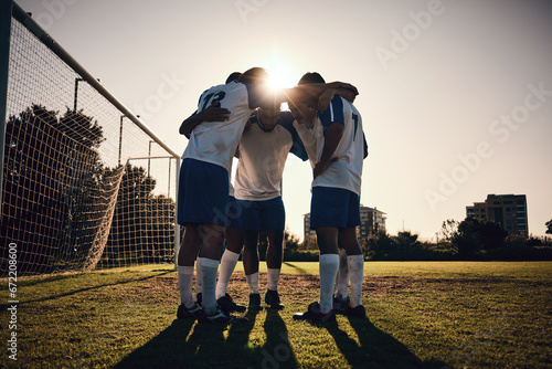 Fotografi Soccer, sunset or team in a huddle for motivation, goals or group mission on stadium field for a sports game