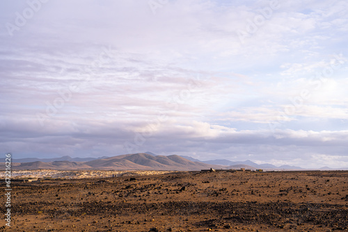 Mountain Range Overlooking Field, Fuerteventura, Spain