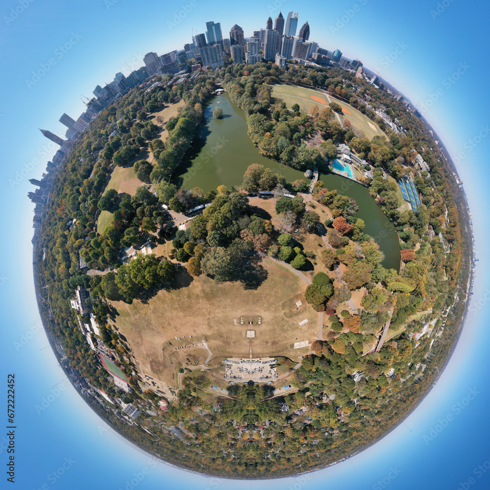 360 degree tiny planet view of Piedmont Park ,lake Clara Meer, swimming pool and Atlanta skyline shot by a drone