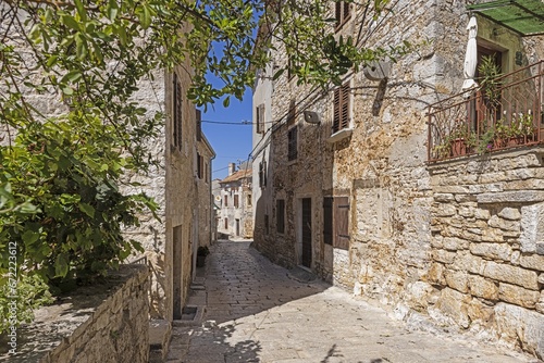 Picture from the town of Groznjan with idyllic cobbled streets and buildings made of natural stone © Aquarius