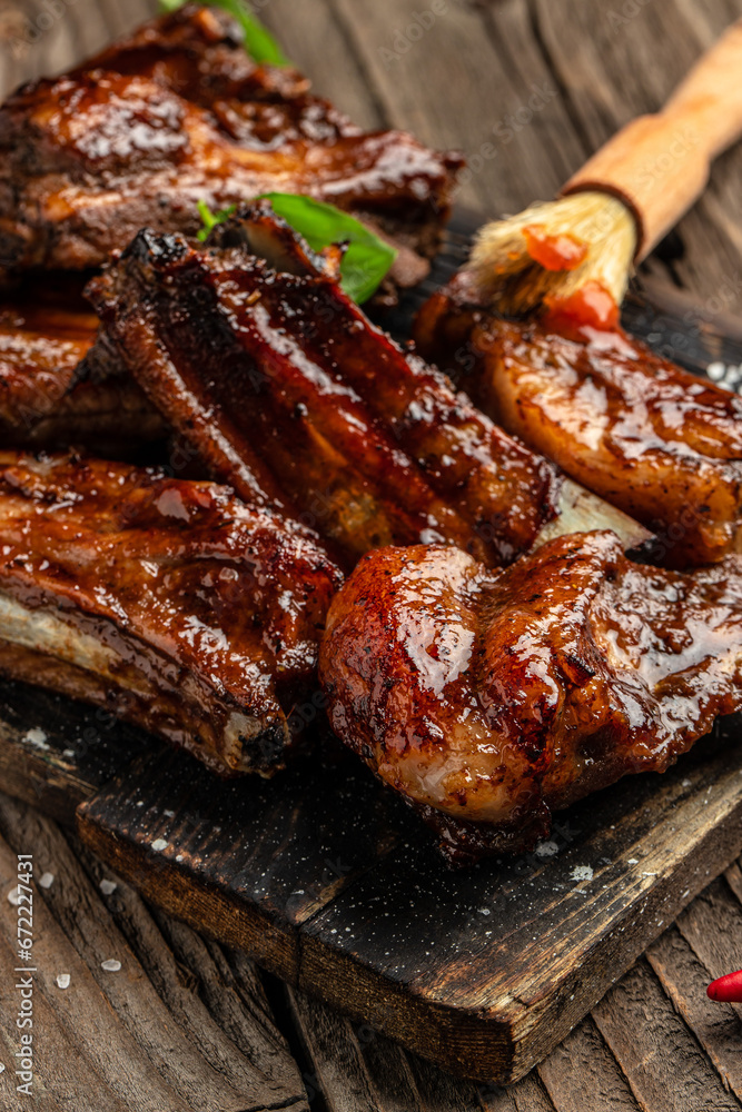 barbecue ribs with sauce. vertical image. top view. copy space for text