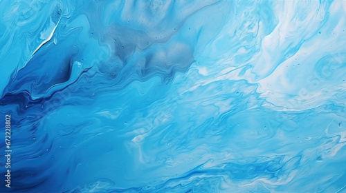 Abstract art blue paint background with liquid fluid grunge texture.