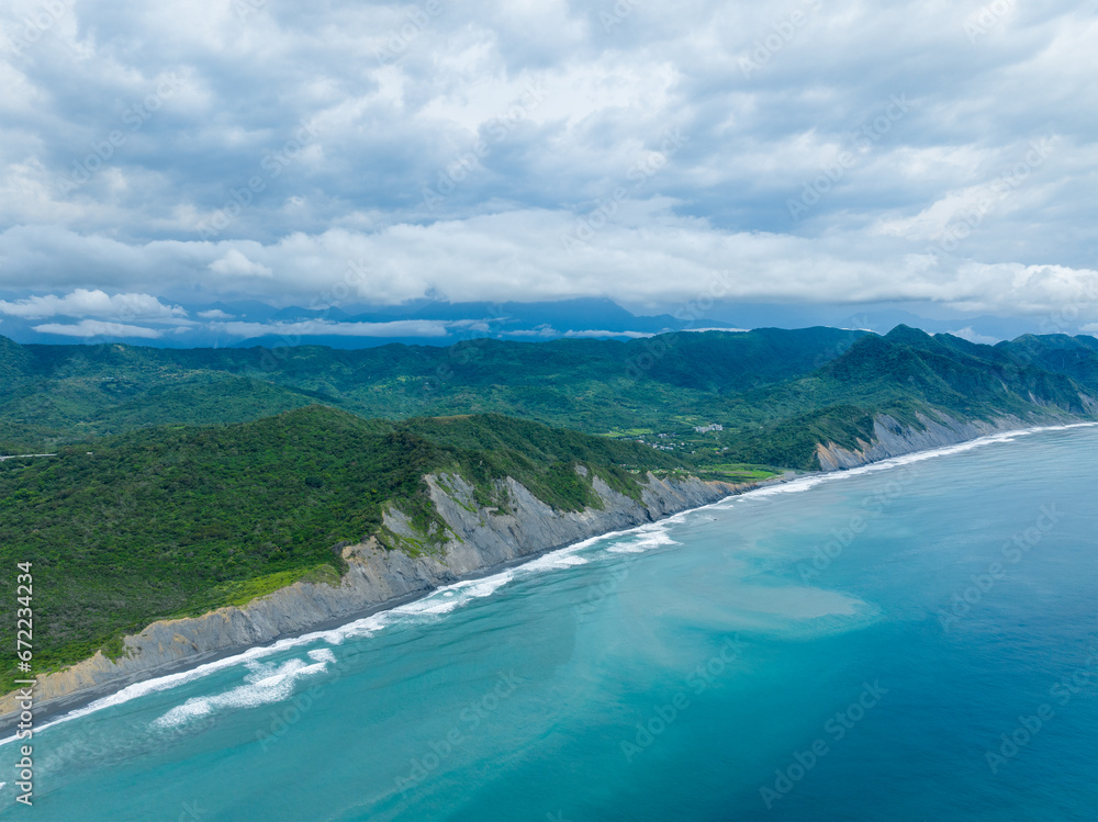 Drone fly over the sea and shore with mountain Drone fly over the sea and shore with mountain
