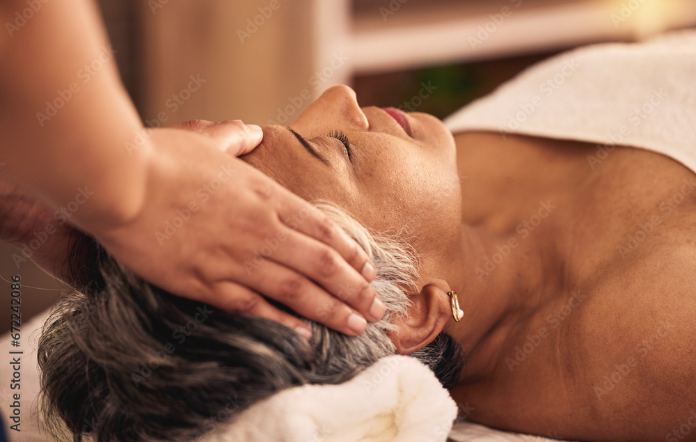 Woman, facial and head massage at spa for beauty, skincare treatment and healing at cosmetics salon. Face of calm mature female client relax at wellness resort for reiki, acupressure and zen therapy - obrazy, fototapety, plakaty 