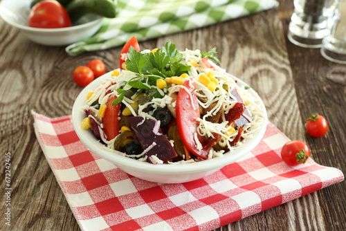 Healthy salad with radish, pepper, tomato and cheese 