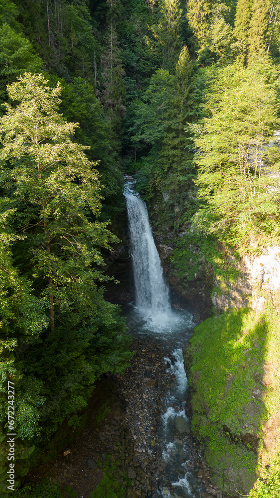 Palovit waterfall. Aerial view of waterfall flowing over mountain covered with forest. Natural beauties of Rize. Tourist places of Turkey. local name palovit selalesi Palovit waterfall. Aerial view of waterfall flowing over mountain covered with forest. Natural beauties of Rize. Tourist places of Turkey. local name palovit selalesi