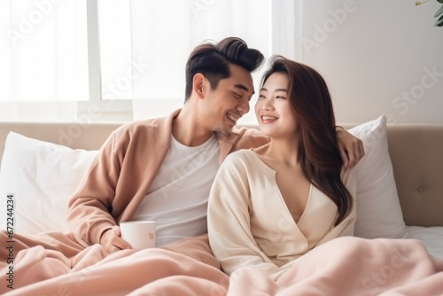 Young couple sweet moment together on bed.