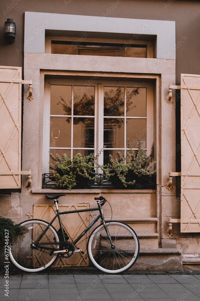 bicycle in front of a house