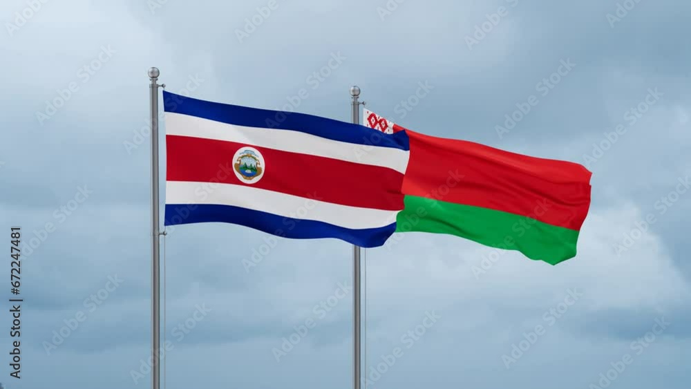 Belarus and Costa Rico flag waving together on cloudy sky, endless seamless loop, two country cooperation concept Belarus and Costa Rico flag waving together on cloudy sky, endless seamless loop, two country cooperation concept