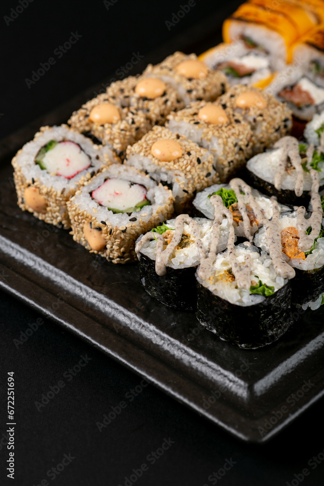 sushi rolls beautifully laid out on the table by Italians, serving sushi to a client, beautiful photos of sushi for advertising sushi rolls beautifully laid out on the table by Italians, serving sushi to a client, beautiful photos of sushi for advertising