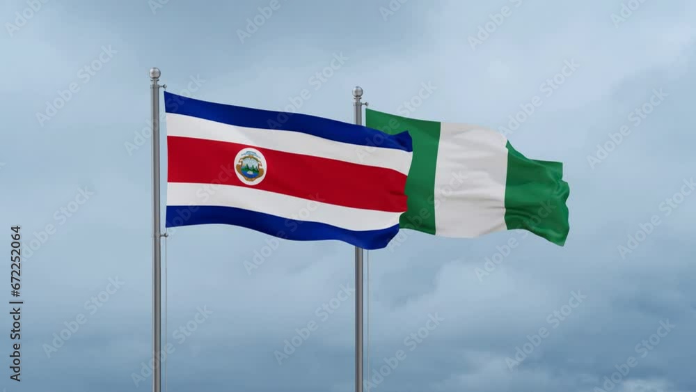 Nigeria flag and Costa Rico flag waving together on cloudy sky, endless seamless loop, two country relations concept Nigeria flag and Costa Rico flag waving together on cloudy sky, endless seamless loop, two country relations concept