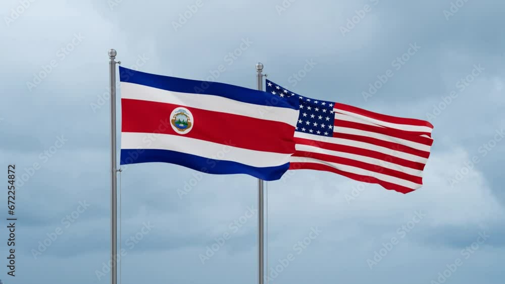 USA and Costa Rico flag waving together on cloudy sky, endless seamless loop, two country cooperation concept USA and Costa Rico flag waving together on cloudy sky, endless seamless loop, two country cooperation concept