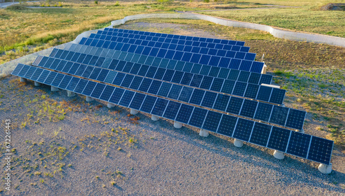 Fényképezés Rows of solar panels mounted on concrete piles