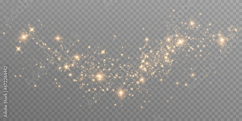 The dust sparks and golden stars shine with special light. Vector sparkles on a transparent background. Christmas light effect. Sparkling magical dust particles. 