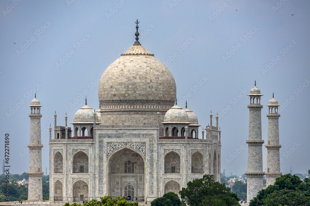 View of the imposing Taj Mahal in Agra, India, with its wonderful architecture on a cloudy day