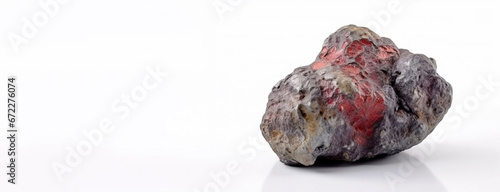 Painite is a rare precious natural geological stone on a white background in low key. AI generated.