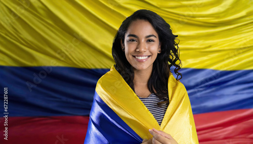 Beautiful woman wrapped in Colombia flag